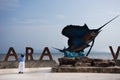 Exterior decoration design and sailfish statue of patio viewpoint Pak Bara village on beach for thai women traveler people travel