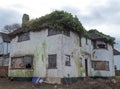 Exterior of derelict house built in 1930s deco style, Rayners Lane, Harrow UK