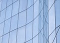 Exterior detail from the glass facade of an office building Royalty Free Stock Photo