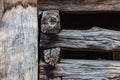 Exterior detail of old wood barn beams, stacked and notched