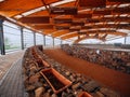 Exterior details of a city concert hall made from wood, stone and metal material. Nobody. Mist in the background. Modern design Royalty Free Stock Photo