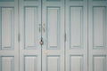 Exterior door with handle and lock in vintage style for background. Royalty Free Stock Photo