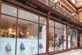 Exterior, entrance and shop sign of Cath Kidston showing window display