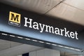 Exterior of entrance to Haymarket Metro Light Rail Station showing Station sign and Metro logo and branding. Underground station