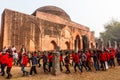 The exterior facade of the domed architecture of a mausoleum in the ancient ruins of the