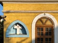 Exterior facade of an old Portuguese era chapel with yellow walls in the Fontainhas district of Royalty Free Stock Photo