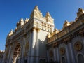 Exterior of the facade of a pompous rich building on a Sunny day