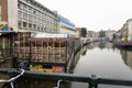 Exterior of famous historic floating market in Singel canal in Amsterdam, reputedly worlds only floating flower market