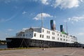 Exterior of a huge ship hotel docked in Gothenburg, Sweden under the blue sky