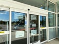 The exterior of a Kohl`s department store with signs warning that one of the entrances is closed due to coronavirus Royalty Free Stock Photo