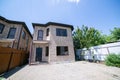 Exterior of a large two story brick residential home containing plenty of copy space Royalty Free Stock Photo