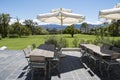 Patio beautiful view to garden with trees and mountains in background. Vineyard in South Africa