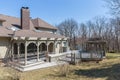 Exterior of a luxurious house with brown brick walls on sale in Overland Park, Kansas, US