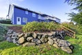 Exterior of luxury blue siding house with backyard view. Royalty Free Stock Photo