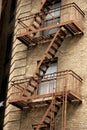 exterior metal fire escapes on apartment building, Greenwich Village