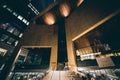 The exterior of the Mint Museum at night, in Uptown Charlotte, N