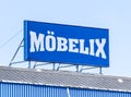 The exterior of Mobelix furniture store in Ostrava with a large banner