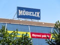 The exterior of Mobelix furniture store in Ostrava with a large banner