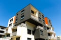 Exterior of a modern apartment buildings on blue sky backgrou