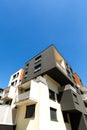 Exterior of a modern apartment buildings on blue sky backgrou