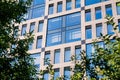 Exterior of modern architecture in the city center. Construction abstract background. Detail of the facade with windows. Royalty Free Stock Photo