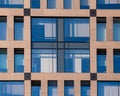 Exterior of modern architecture in the city center. Construction abstract background. Detail of the facade with windows. Royalty Free Stock Photo