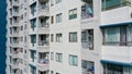 Exterior of a modern high-rise multi-story apartment building condo - facade, windows and balconies Royalty Free Stock Photo