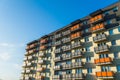 Exterior of modern residential apartment building with balconies on housing estate. Royalty Free Stock Photo