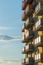 Exterior of modern residential apartment building with balconies on housing estate. Royalty Free Stock Photo