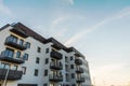 Exterior of modern residential apartment building with balconies on housing estate. Royalty Free Stock Photo