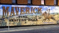 Exterior mural by Western artist Stylle Read, on the side of the building that houses Maverick Fine Western Wear