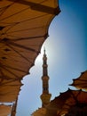 Exterior of Nabawi Mosque building and electronic umbrella in Medina