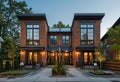 The exterior of new home. Modern home with brick exterior and black windows. Royalty Free Stock Photo