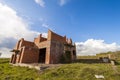 Exterior of an old building under construction. Orange brick walls in a new house. Royalty Free Stock Photo