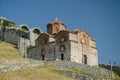 Exterior of an old stone church under the clear blue sky, Berat, Albania Royalty Free Stock Photo