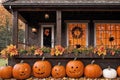 exterior of the old wooden house is decorated with harvest of pumpkins and leaves for halloween holiday, door and window Royalty Free Stock Photo