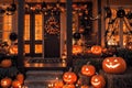 exterior of the old wooden house is decorated with harvest of pumpkins and leaves for halloween holiday, door and window Royalty Free Stock Photo