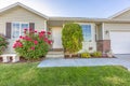 Exterior of one storey single family home with a beautiful front garden Royalty Free Stock Photo