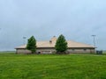 The exterior of Ottumwa, Iowa Regional Airport on a cloudy rainy day