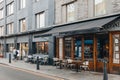 Exterior and outdoor tables of Cecconi\'s restaurant in Spitalfields, London, UK