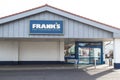 Exterior outside shot of Franks Carpter Flooring Store showing company sign and entrance