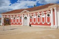 Exterior of the red painted stables building next to Rundale palace in Pilsrundale, Latvia. Royalty Free Stock Photo