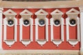 Exterior of the red painted stables building windows next to Rundale palace in Pilsrundale, Latvia. Royalty Free Stock Photo