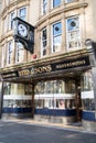 Exterior of Reid and Sons Jewellers High Street store showing window display, company name, logo, branding and signage