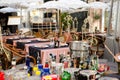 Rome, Italy. November 2017. Tables laid and decorated with delicious embroidered umbrellas. Table with alcoholic drinks in the for