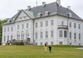 The exterior of the Royal Marselisborg Palace, People visit the garden around the castle