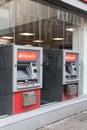 Exterior of Santander Bank ATM cashpoints outside in street.  Two machines Royalty Free Stock Photo