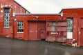 Exterior section of an old red brick industrial building Royalty Free Stock Photo