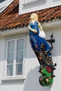 Exterior of the ship figurehead attached to the facade of a house in Frogn, Norway.