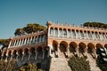 Exterior shot of a decorated stone building in the Park of Villa Mylius, Genoa